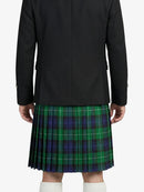 Person wearing a black coat and green plaid kilt on a white background
