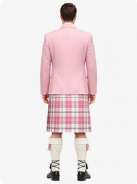 Person wearing a pink blazer and plaid kilt on a white background