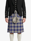 Person wearing a black jacket and blue plaid kilt with a silver sporran on a white background