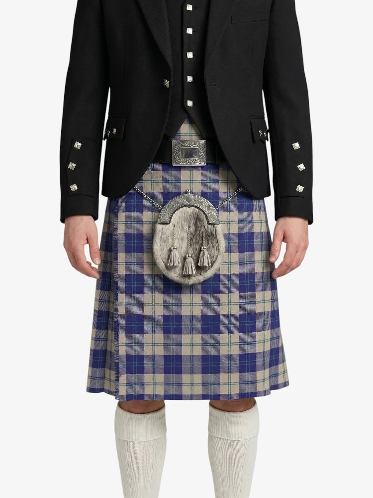 Person wearing a black jacket and blue plaid kilt with a silver sporran on a white background
