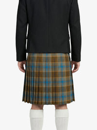Person wearing a black jacket and plaid kilt on a white background