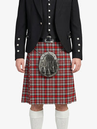 Person wearing a traditional Scottish kilt with a sporran on a white background