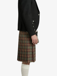 Person wearing a black jacket and plaid kilt on a white background