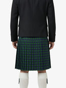 Person wearing a black jacket and green plaid kilt on a white background