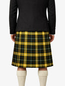 Person wearing a black jacket and yellow plaid kilt on a white background