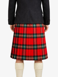 Red plaid kilt worn by a person on a white background