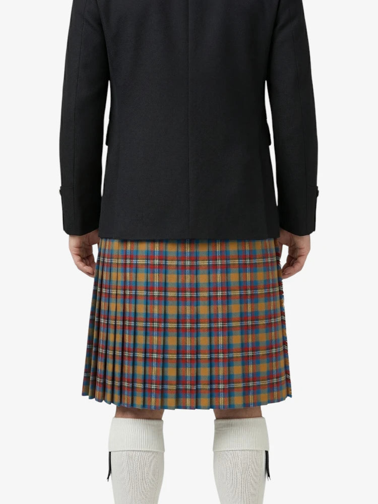 Person wearing a black coat and plaid skirt on a white background