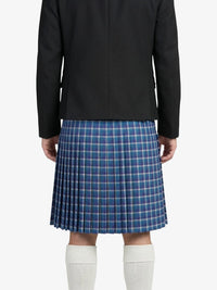 Person wearing a black jacket and blue plaid kiilt on a white background