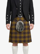 Person wearing a traditional Scottish kilt with a jacket on a white background