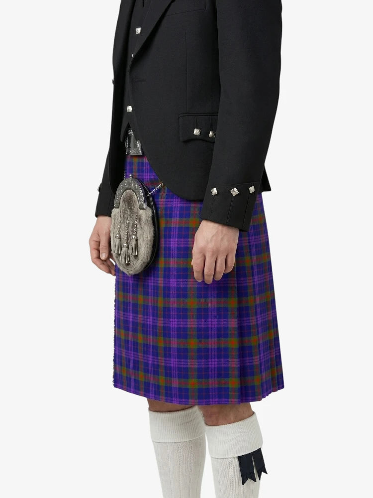 Person wearing a black jacket, purple plaid kilt, and white socks on a white background