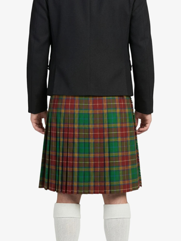 Person wearing a black jacket and plaid kilt on a white background