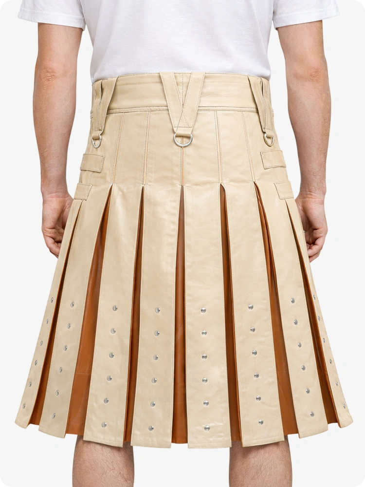 Beige pleated skirt with brown accents worn by a person on a white background