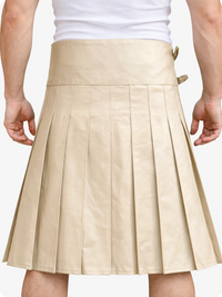 Beige pleated skirt worn by a person on a white background