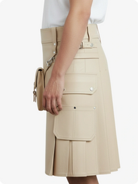 Beige cargo skirt worn by a person on a white background