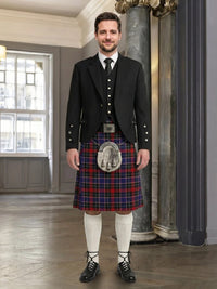 Man wearing a traditional Scottish kilt in an elegant interior setting