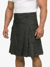 Person wearing a gray kilt on a white background