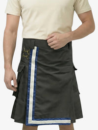 Person wearing a black kilt with blue and white trim on a plain background