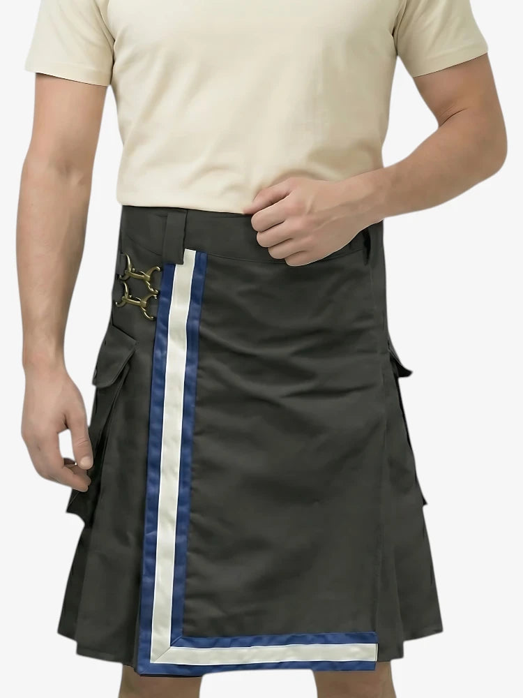 Person wearing a black kilt with blue and white trim on a plain background