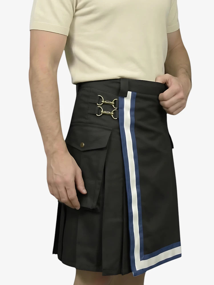 Black kilt with white and blue trim worn by a person on a plain background