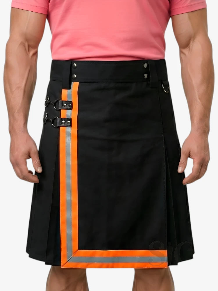 Black kilt with orange trim worn by a person in a pink shirt on a white background