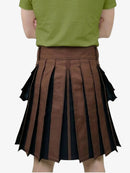 Brown pleated skirt worn by a person on a white background