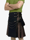 Person wearing a black and brown kilt with gold buttons and chains on a white background