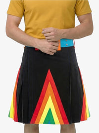Person wearing a black kilt with rainbow-colored triangles on a white background
