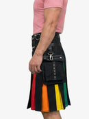 Black kilt with colorful accents worn by a person on a white background