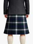 Person wearing a dark gray coat with a plaid kilt on a white background