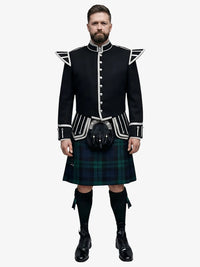 Man wearing a traditional Scottish doublet kilt outfit with a white background