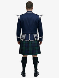 Person wearing a traditional Scottish kilt with a navy doublet jacket on a white background