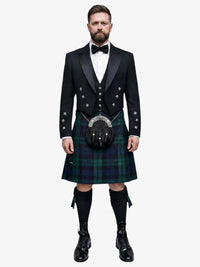 Man wearing a traditional Scottish black watch tartan kilt with a black prince charlie jacket on a white background
