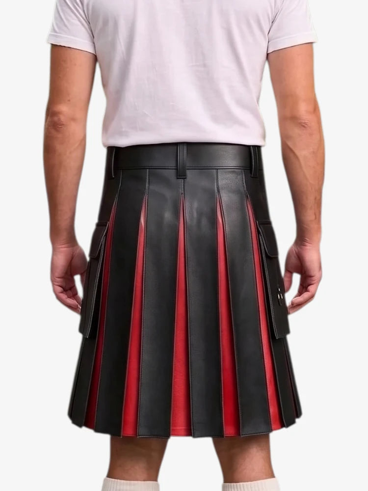 A man wearing a black pleated leather kilt with red vertical stripe accents, paired with a white t-shirt and white socks, shown from the back against a light gray background.