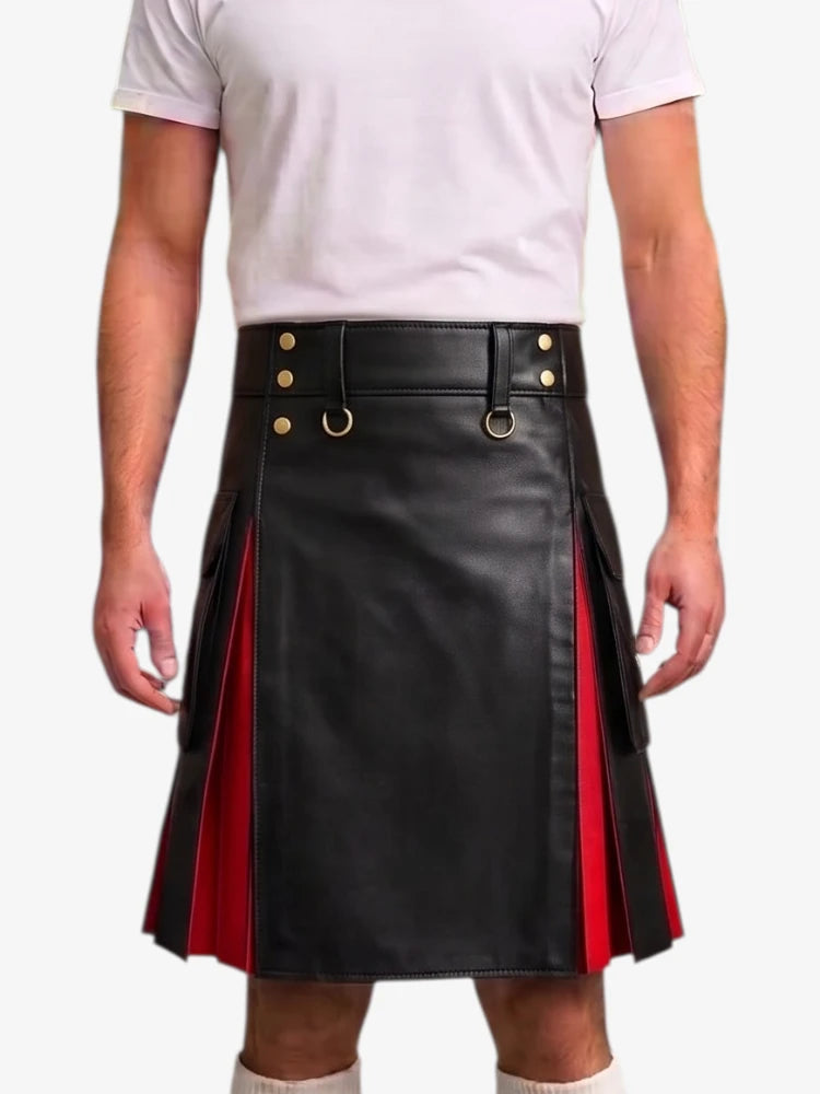 A man wearing a black faux-leather kilt with red side panels and gold-tone hardware, paired with a white t-shirt against a light gray background.