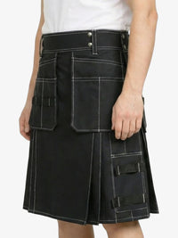 Black kilt with multiple pockets on a white background