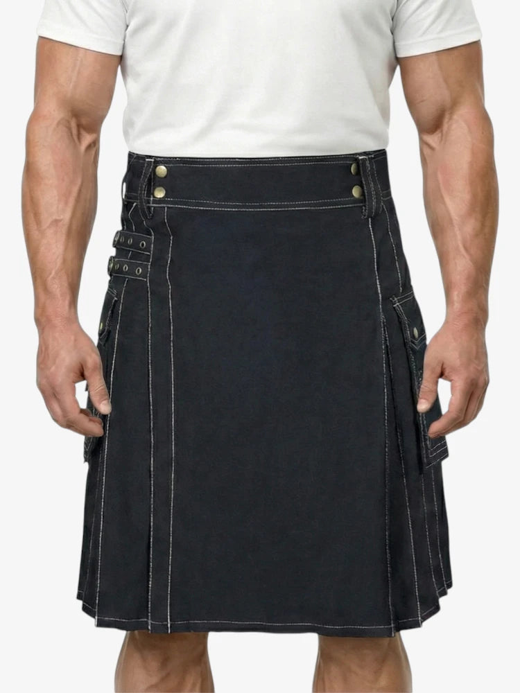 Man wearing a black kilt on a white background