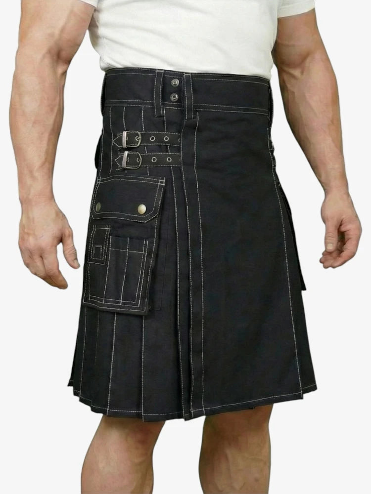 Person wearing a black kilt on a white background
