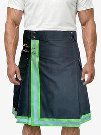 Man wearing a black kilt with green and gray accents on a white background