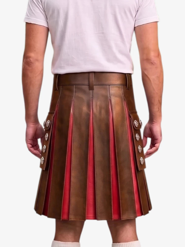 A man wearing a brown pleated leather kilt with red lining and decorative silver-tone buttons, paired with a white t-shirt, shown from the back against a light gray background.