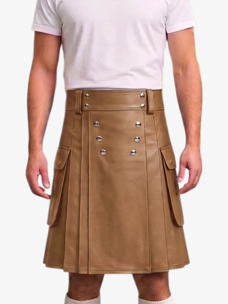 A model wearing a brown faux-leather kilt with silver-tone double-breasted buttons and side cargo pockets, paired with a white t-shirt and white socks, against a light gray background.
