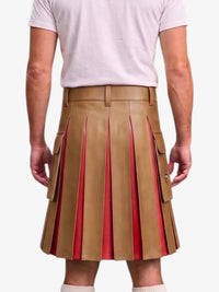 A person shown from the back wearing a tan pleated leather kilt with red inner lining and side flap pockets, paired with a light pink T-shirt against a plain light background.