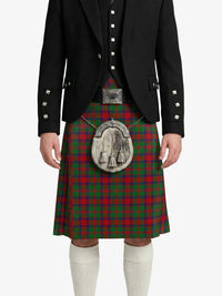Person wearing a traditional Scottish kilt with a tartan pattern on a white background