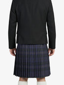 Person wearing a black blazer and plaid kilt on a white background