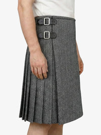 Gray pleated kilt with belt on a white background