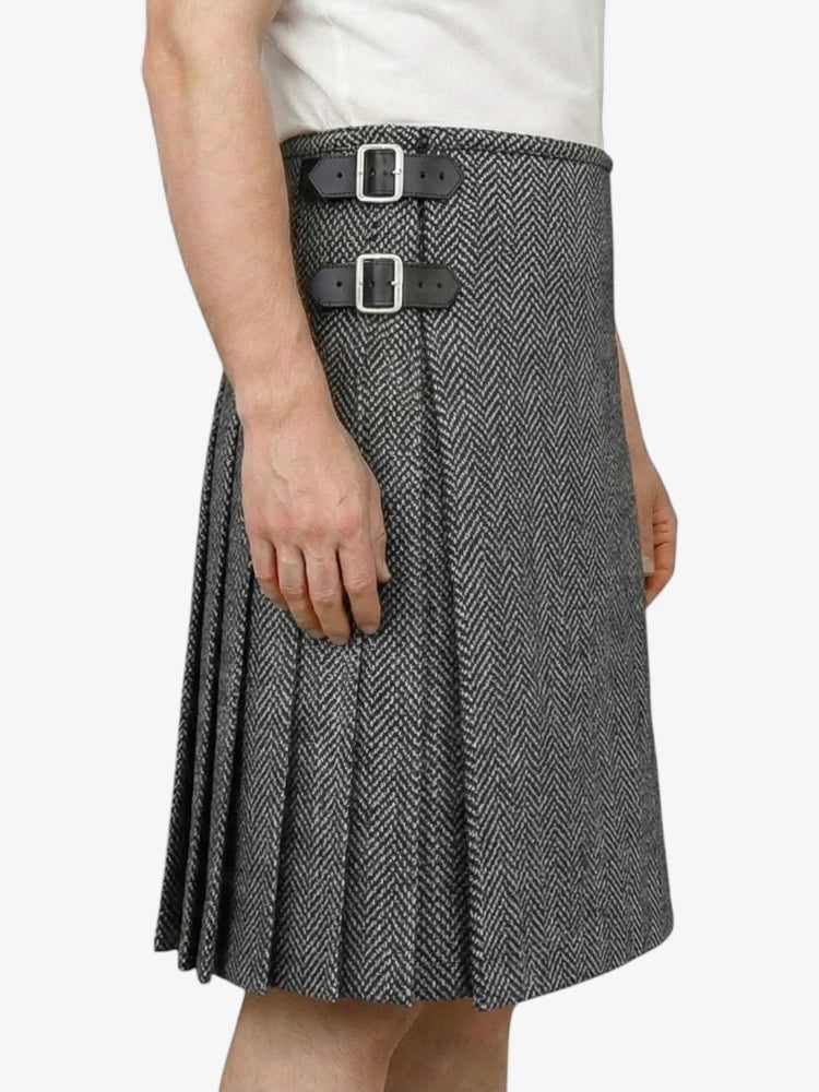 Gray pleated kilt with belt on a white background
