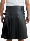 Black pleated skirt worn by a person on a white background