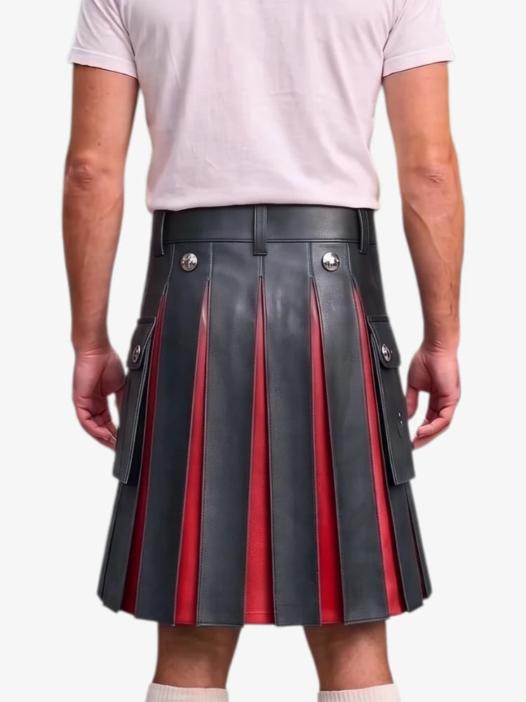 A man wearing a black pleated leather kilt with red vertical stripe accents and silver-tone metal buttons, paired with a light pink t-shirt, shown from the back against a light gray background.