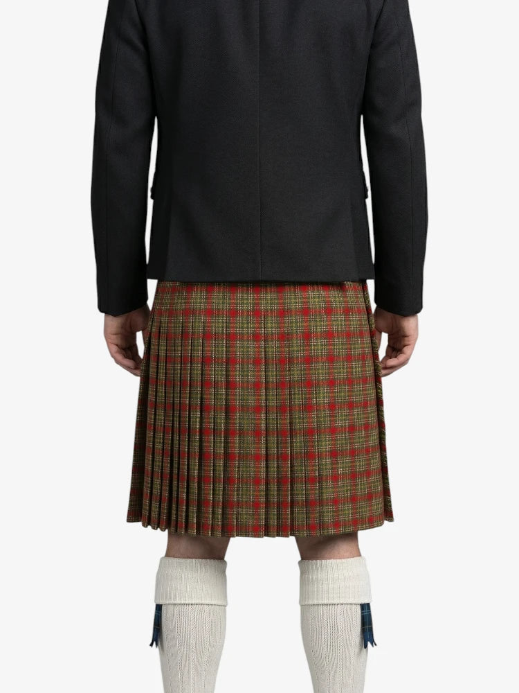 Person wearing a black coat and red plaid kilt on a white background