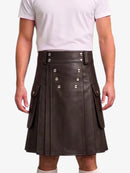 A dark brown faux-leather kilt with silver-tone metal buttons and flap pockets, worn by a model in a white t-shirt against a light gray background.