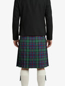 Person wearing a black jacket and plaid kilt on a white background